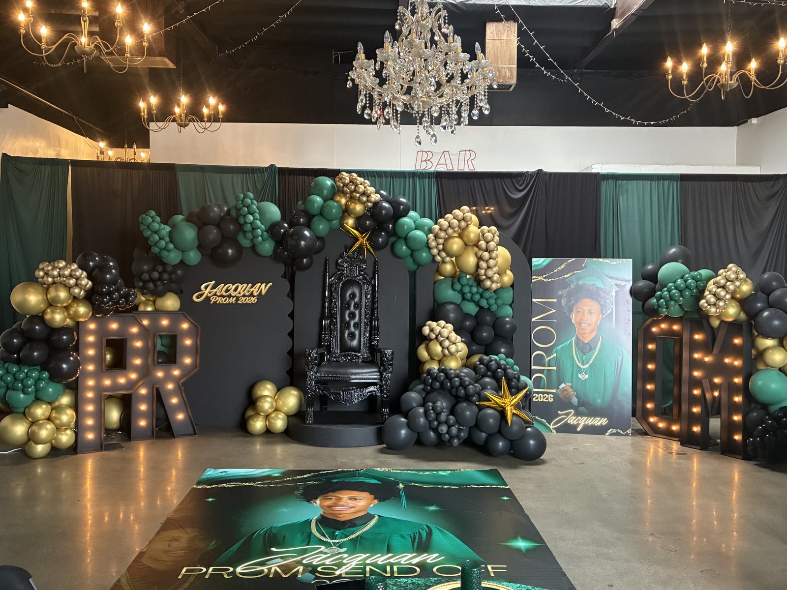 Emerald, black and gold prom send-off with marquee letters and a throne, fully produced by Evalasting Events